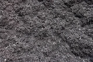 Black mulch in Paver World’s original material or showroom photograph
